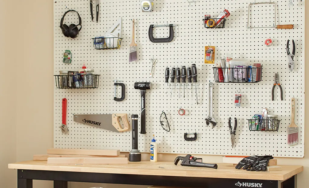 Pegboard Tool Wall with Mower Storage